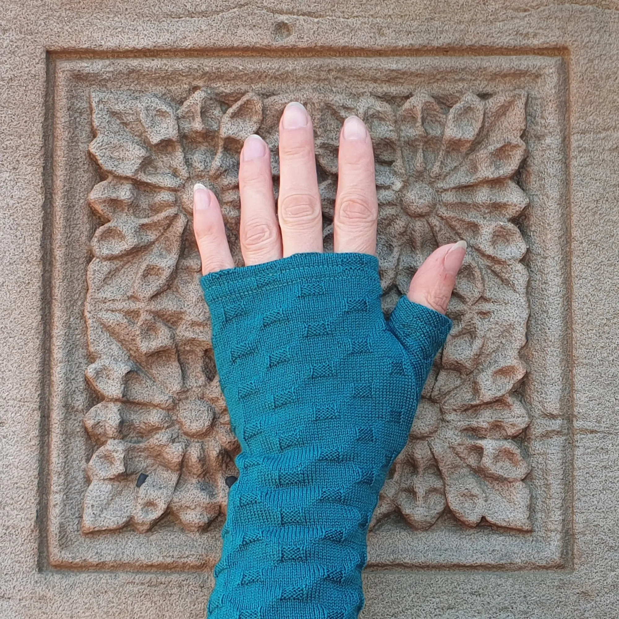 Teal crosses knit merino fingerless gloves